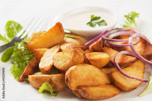 Fried potato wedges