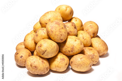 White Potatoes isolated on a white studio background.