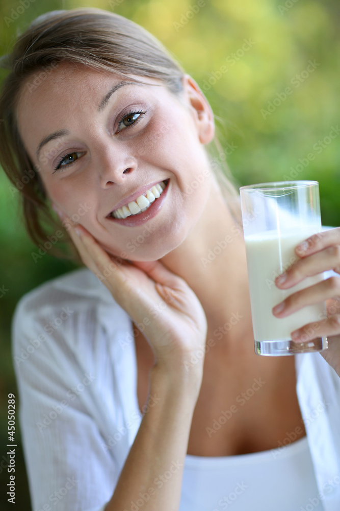 Portrait of healthy girl drinking milk Portrait of healthy girl drinking milk