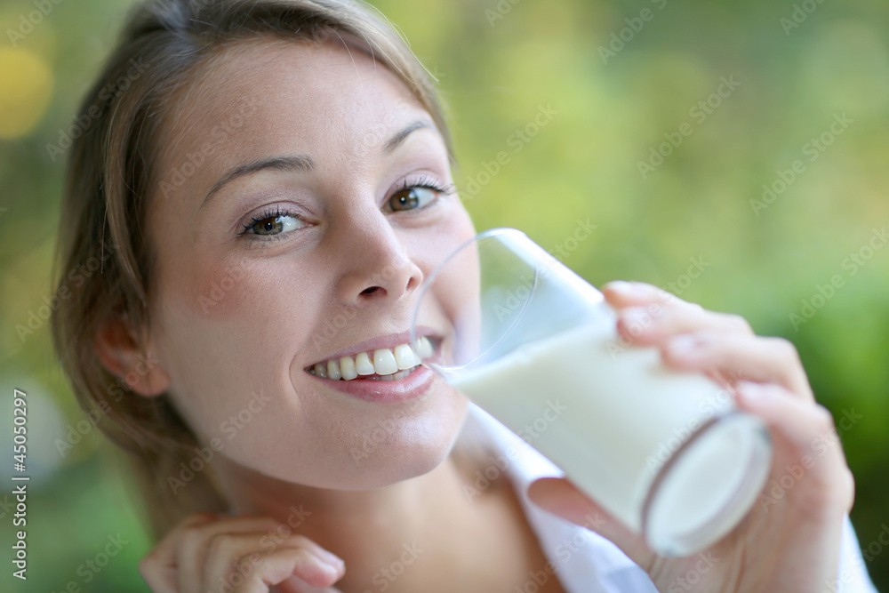 Portrait of healthy girl drinking milk Portrait of healthy girl drinking milk