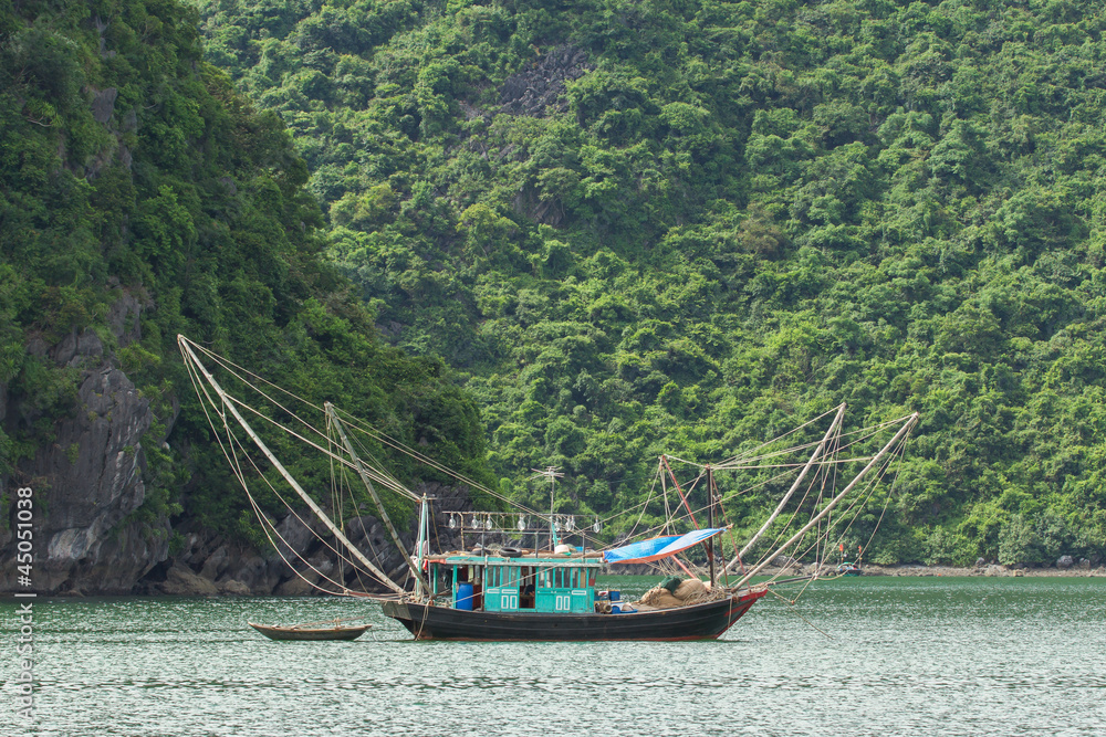 Fishing boat in the Ha Long Bay Fishing boat in the Ha Long Bay