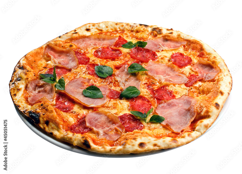 round pizza with ham, tomatoes and greens