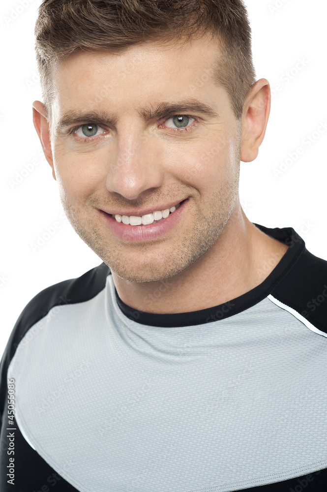 Fototapeta premium Young caucasian male in sportswear, closeup shot