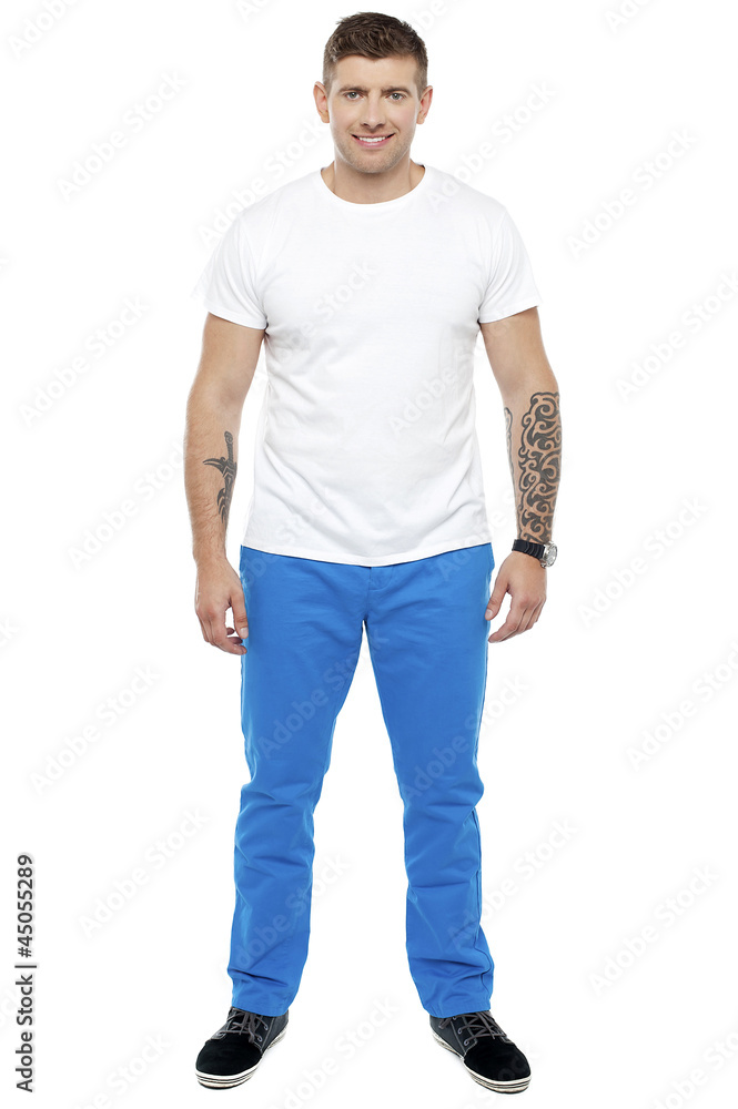 Handsome guy with tattoos posing casually Handsome guy with tattoos posing casually