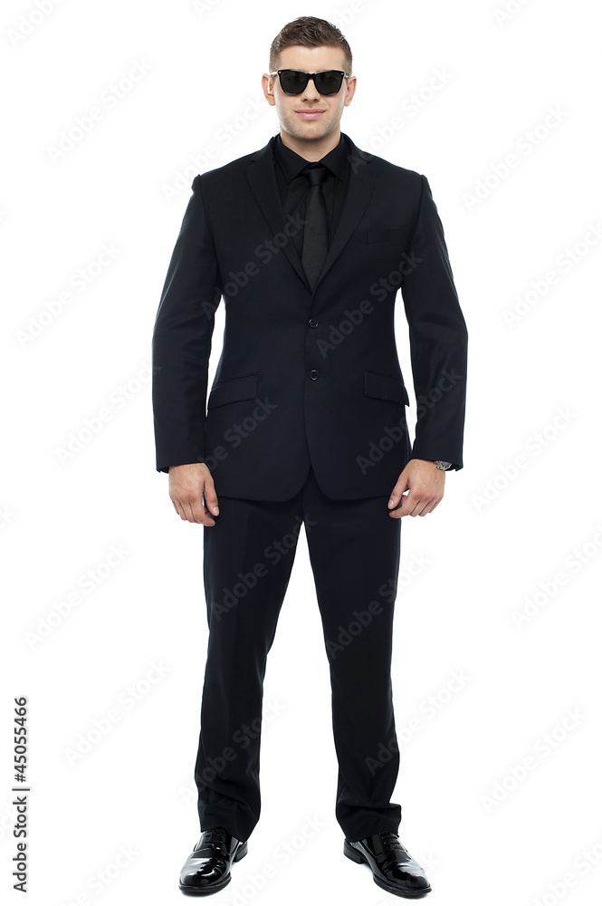Full length picture of smart security personnel Full length picture of smart security personnel