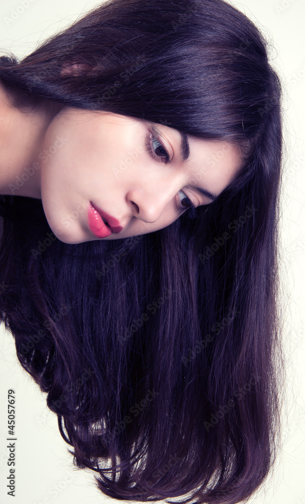 Obraz premium Beautiful Brunette Girl. Healthy Long Hair