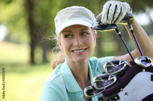 Quadro su tela Woman on golf course