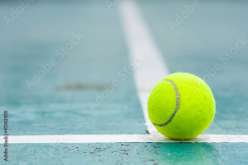 Tennis ball on the field. © vachiraphan