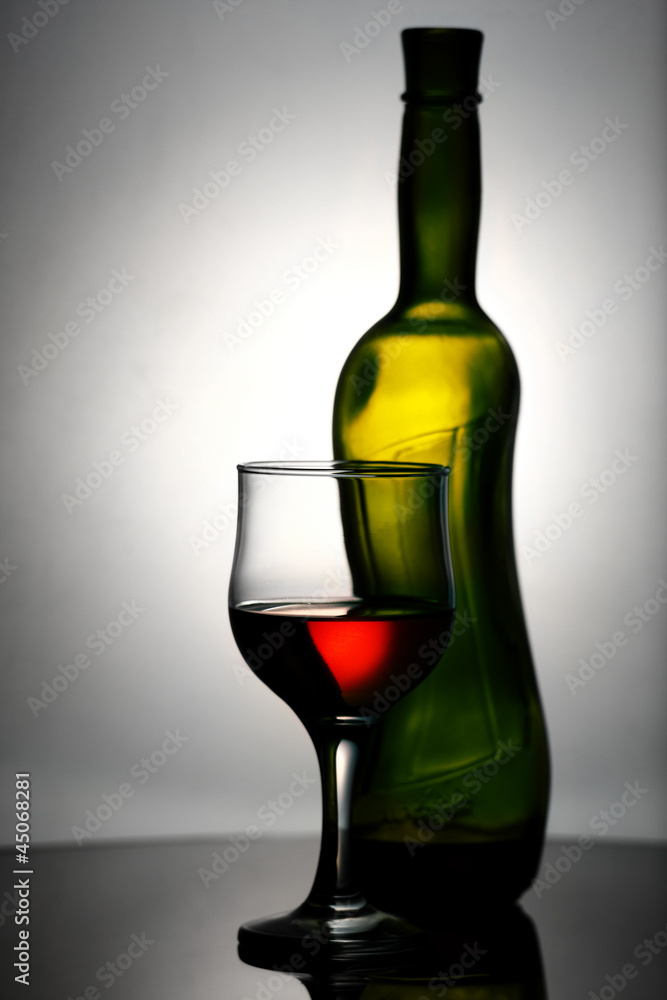 Abstract wine still life over grey backgrounds Abstract wine still life over grey backgrounds