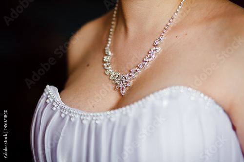 adornment on neck of bride