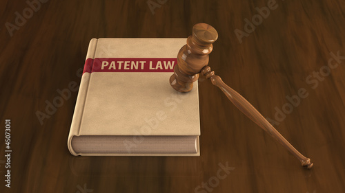 Patent law book with gavel on it