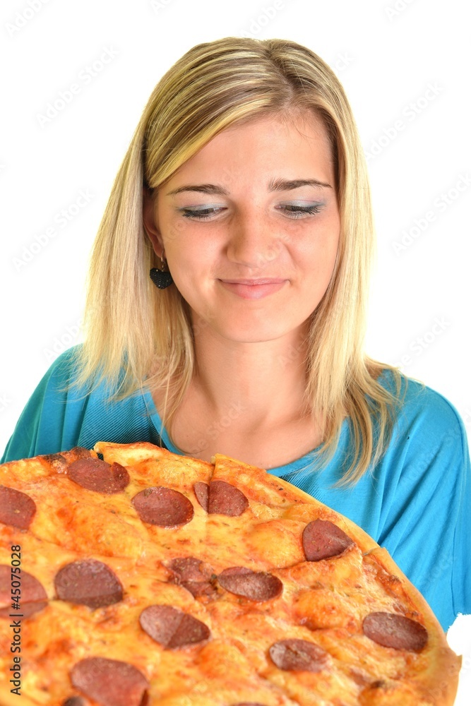Young happy woman eating pizza, isolated on white Young happy woman eating pizza, isolated on white