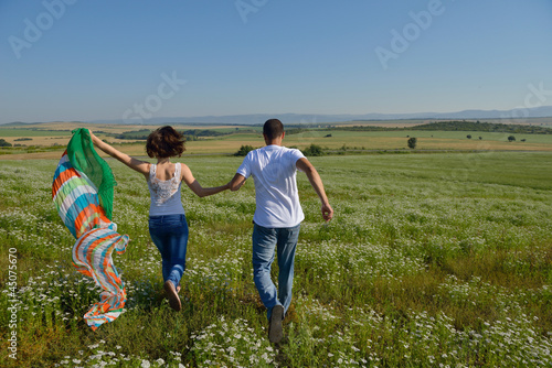 happy couple in wheat field