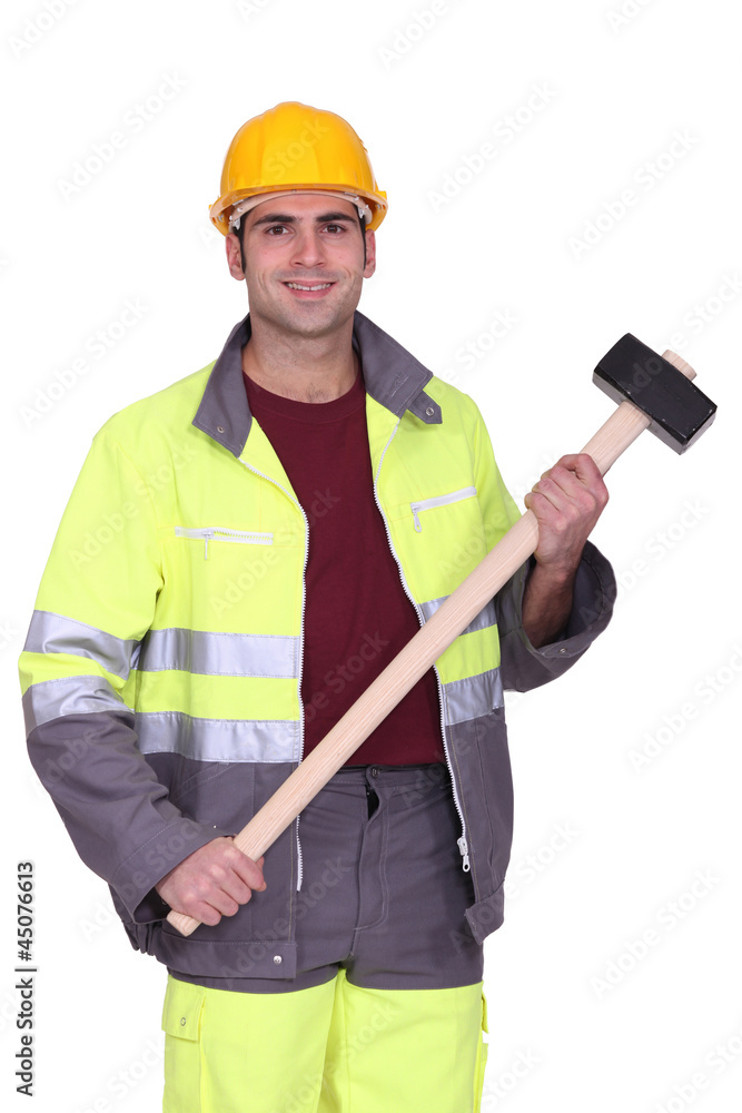 Traffic guard holding a mallet Traffic guard holding a mallet
