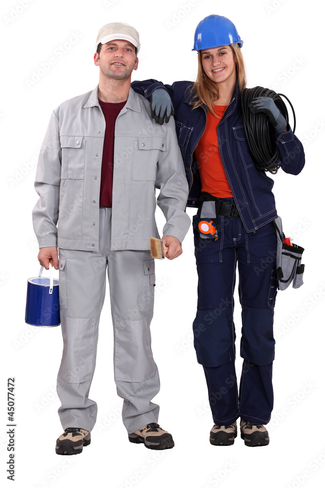 painter and electrician standing together painter and electrician standing together