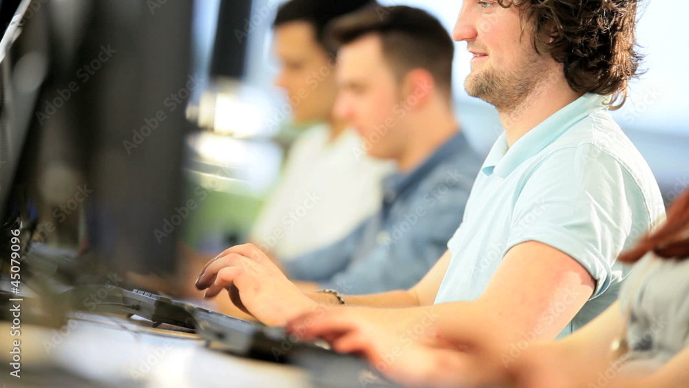 Multi ethnic students researching information in university Multi ethnic students researching information in university