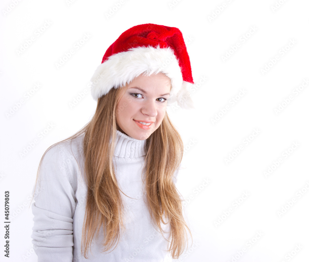 Beautiful girl in a Christmas hat Beautiful girl in a Christmas hat