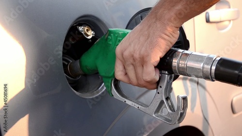refueling a car with unleaded petrol