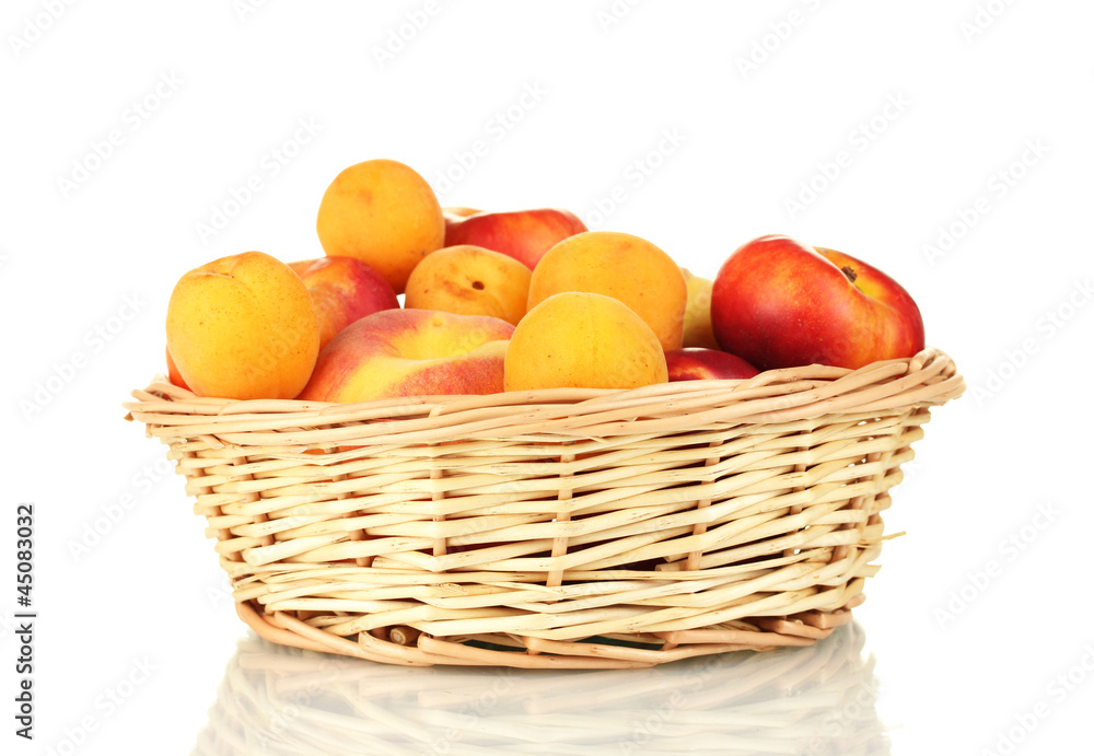 Ripe fruit in basket isolated on white Ripe fruit in basket isolated on white