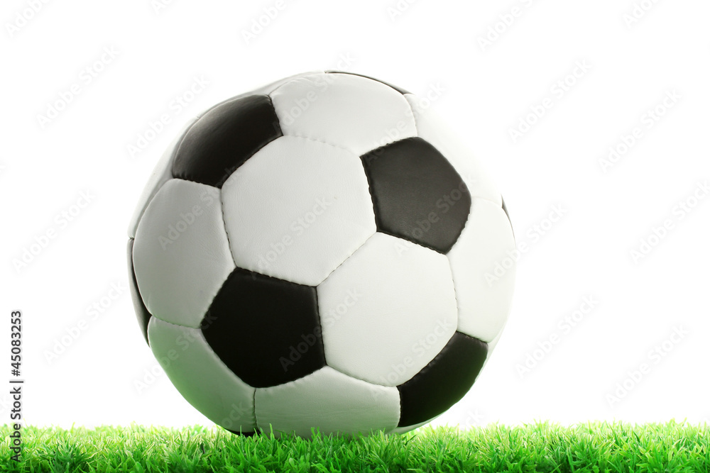 Fototapeta premium football ball on green grass, isolated on white