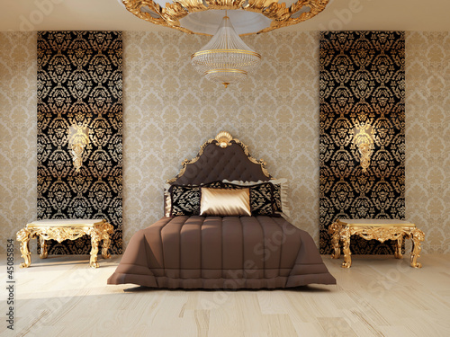 Luxury bedroom with golden furniture in royal interior