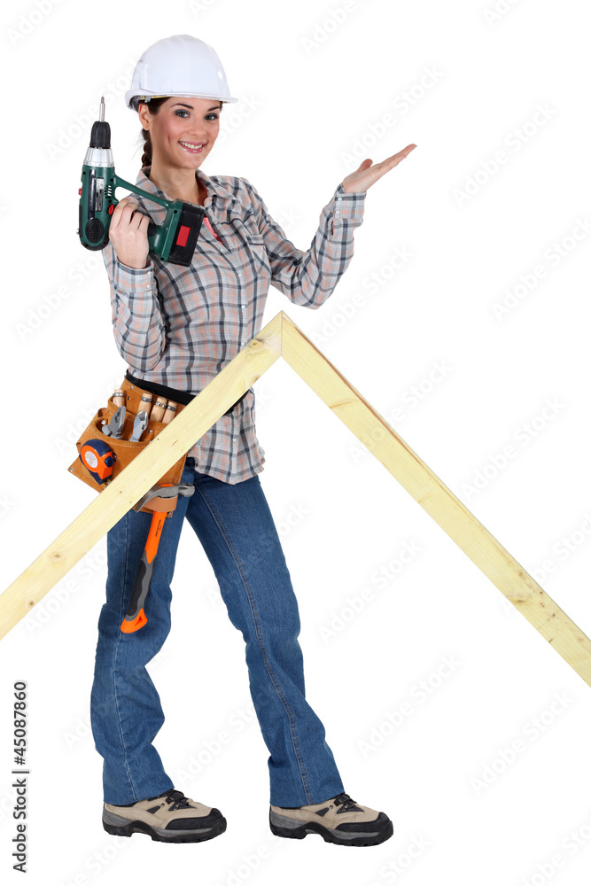 Woman with drill and wooden triangle Woman with drill and wooden triangle