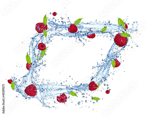  Fresh raspberries falling in water splash on white background