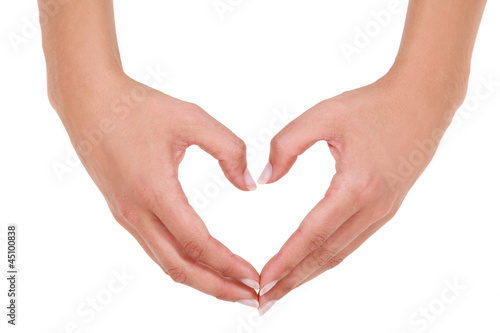 woman making a hearth symbol with her hands