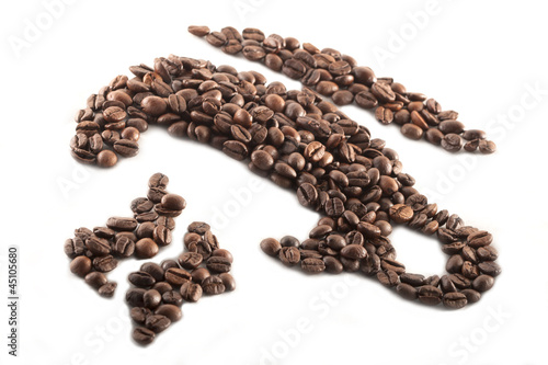 Roasted coffee beans in the shape of a cup