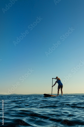 Woman on Stand Up Paddle Board at Sunset © Terry Schmidbauer