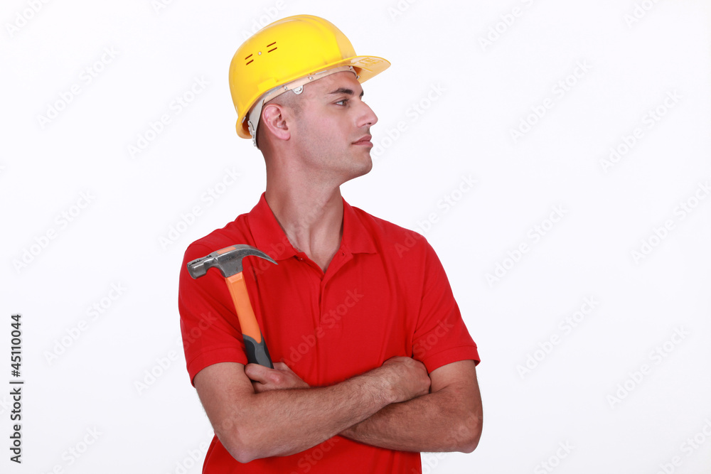 Handy man stood with his arms crossed