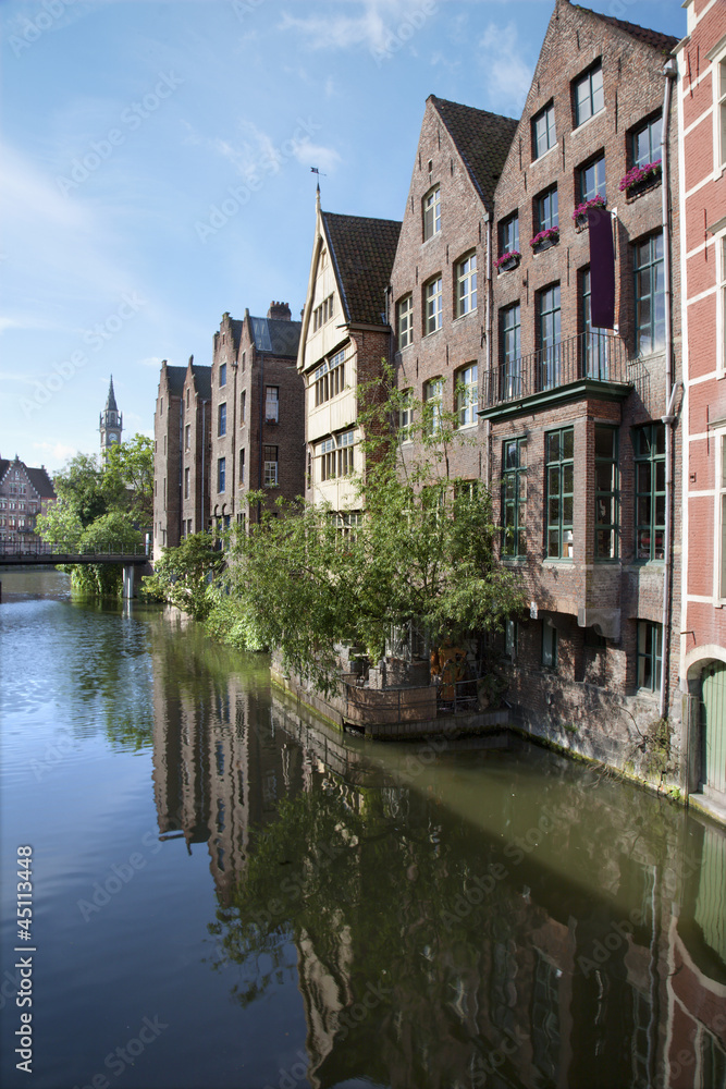 Ghent - canal and typical brick houses in morning light