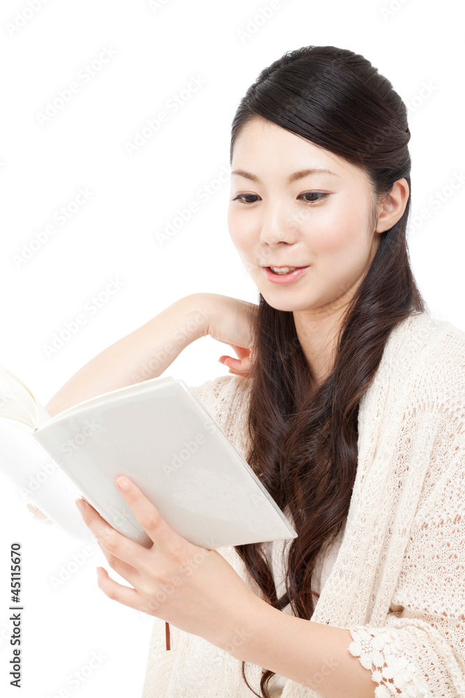 Beautiful young woman reading a book. Portrait of asian. Beautiful young woman reading a book. Portrait of asian.