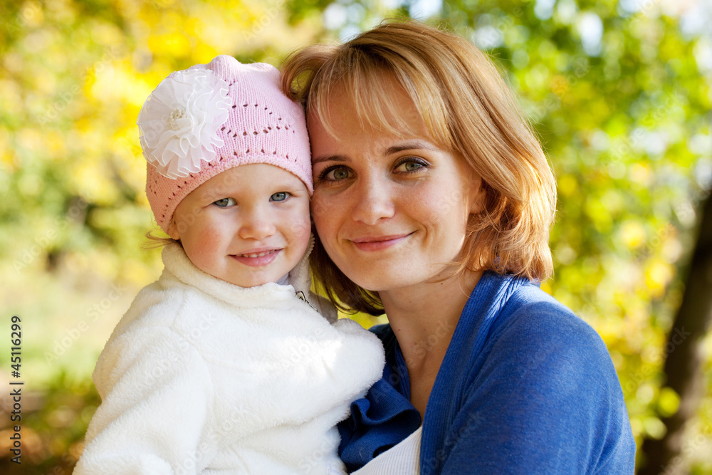 Happy little girl with her mother Happy little girl with her mother