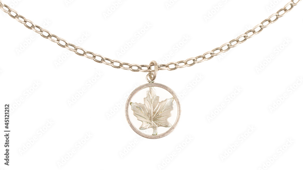 Old filthy silver hanger on a silver chain (maple leaf) Old filthy silver hanger on a silver chain (maple leaf)