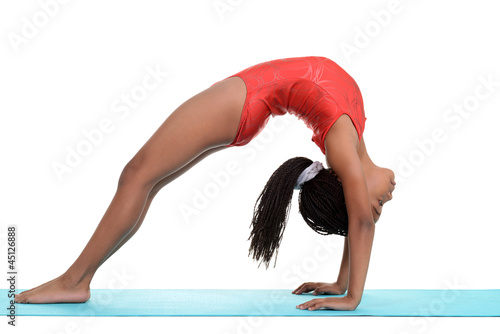 South African child doing gymnastics bridge