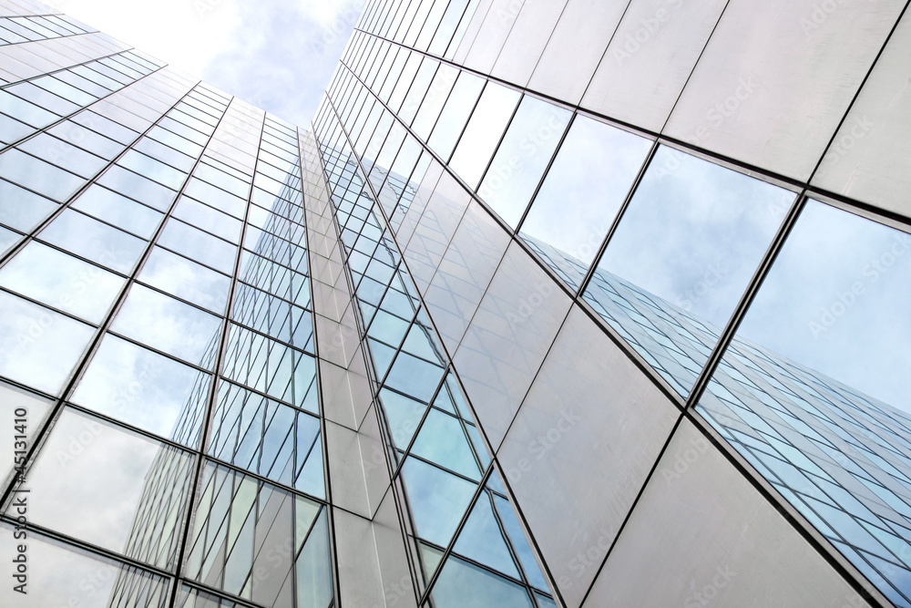 modern facade of glass and steel with reflections modern facade of glass and steel with reflections