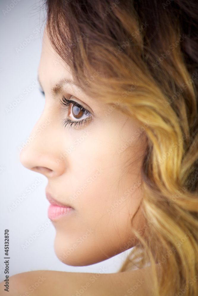 Beautiful profile of young woman with big eyes and lips Beautiful profile of young woman with big eyes and lips