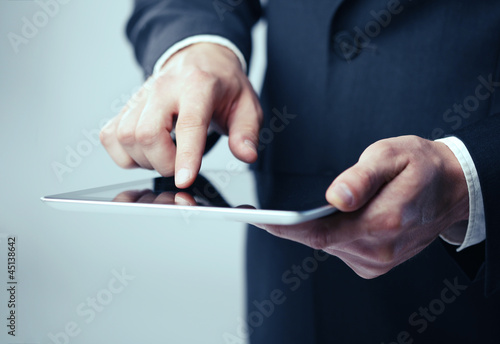 man holding tablet