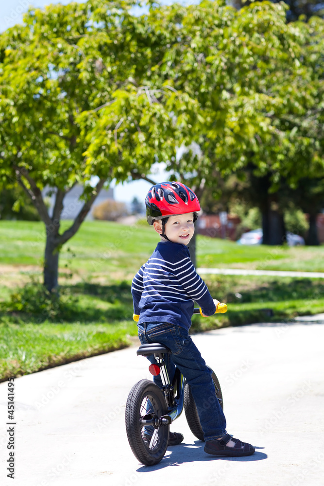 Fototapeta premium toddler on a balance bike