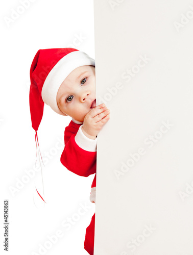 small Santa claus child loo...