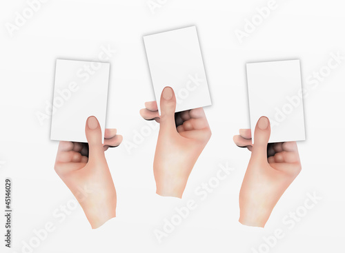 Three Hands Holding Blank Business Cards