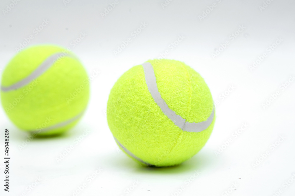 closeup of two tennis balls