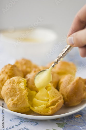 Сhoux pastry are filling with cream