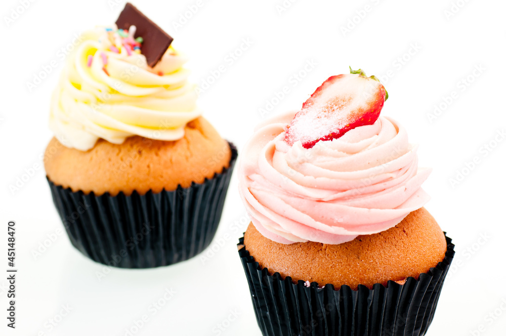 Strawberry and vanilla cupcake close up
