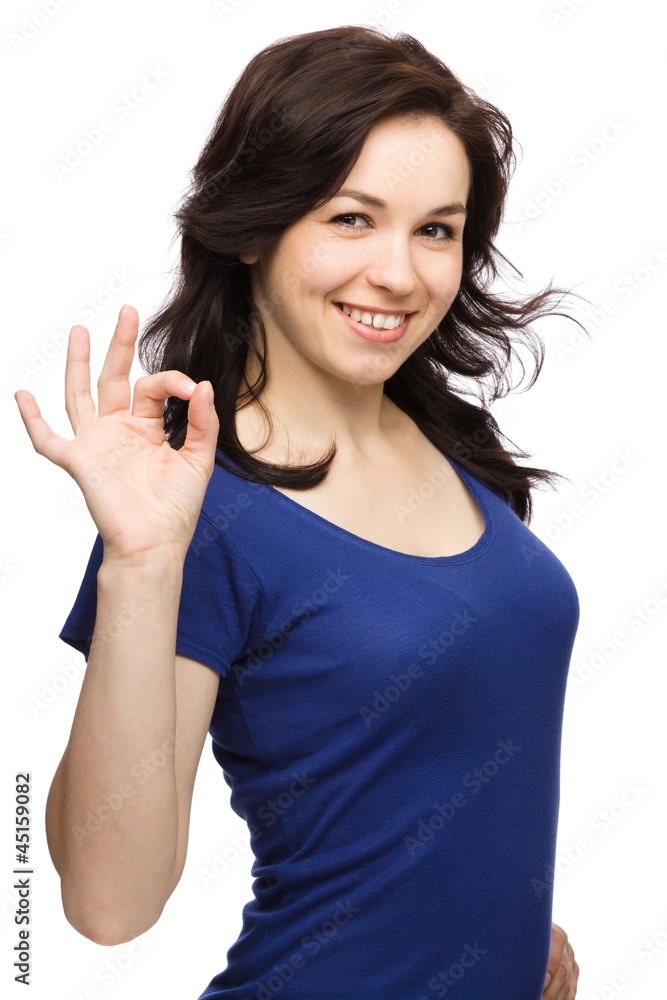 Fototapeta premium Woman is showing OK sign