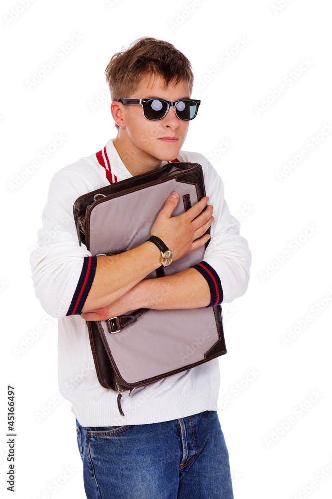Portrait of sleazy young man posing on white background with bag Portrait of sleazy young man posing on white background with bag