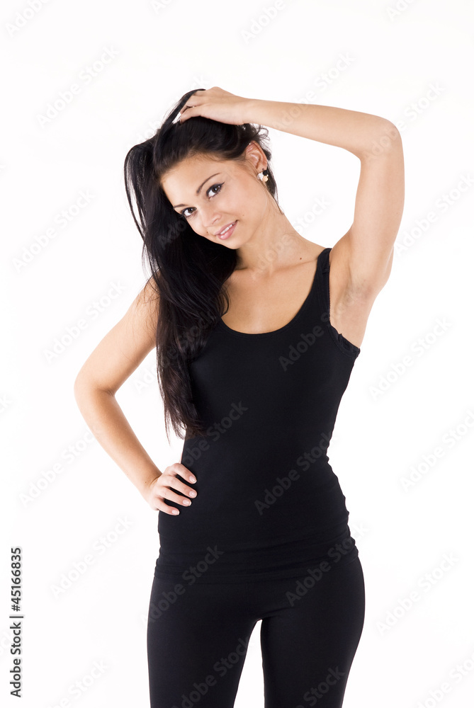 Young happy attractive girl posing in studio . Young happy attractive girl posing in studio .