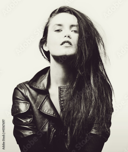 Beautiful woman portrait in rock style