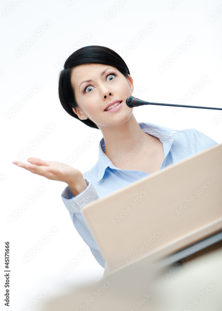 Female orator at the podium. Business training Female orator at the podium. Business training